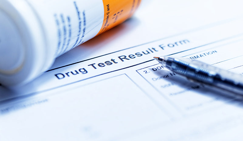 CBD pills by a drug test. Does CBD show up on a drug test?