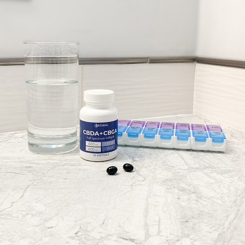 Full Spectrum CBDA+CBGA Softgels in bathroom counter