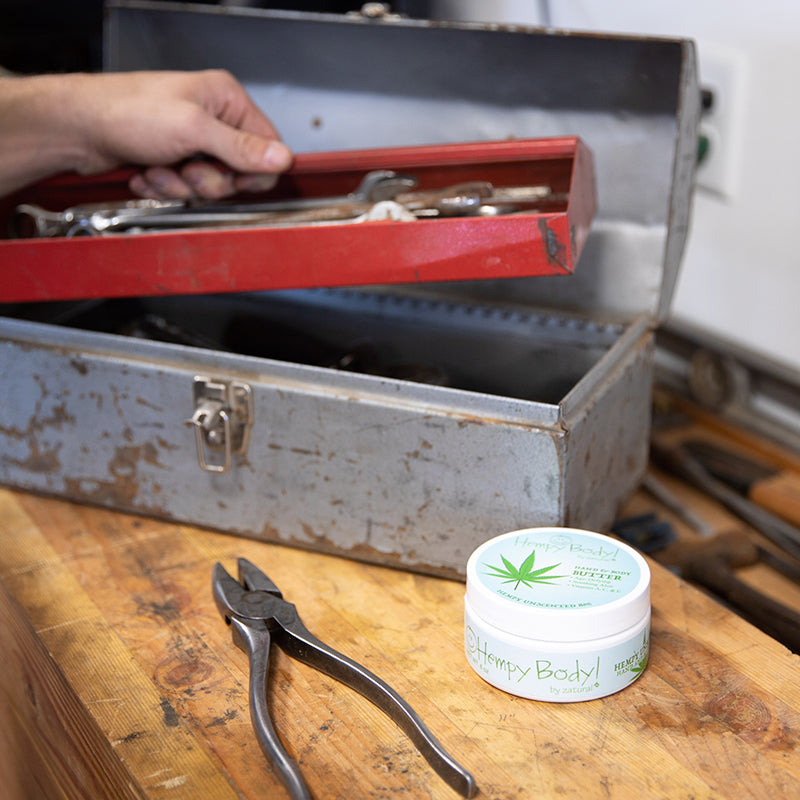 Hempy unscented Body Butter Jar on a work bench