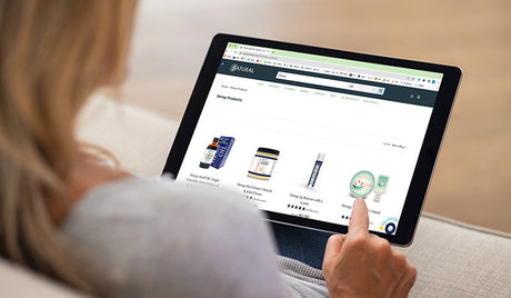 CBD hemp oil on display on a dish. Where to buy hemp oil online in the USA. Where to buy cbd oil?