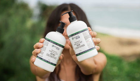 Woman with beautiful long dark hair. hemp seed oil for hair. hemp oil for hair growth.