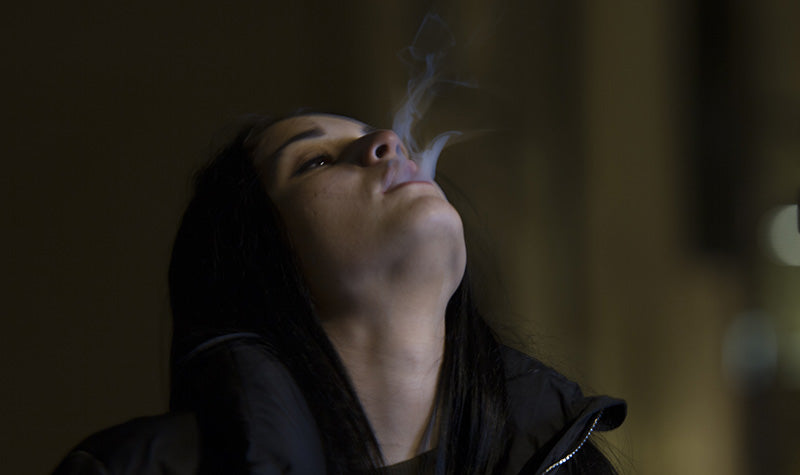 Women smoking vapor. Will Hemp oil get you high?