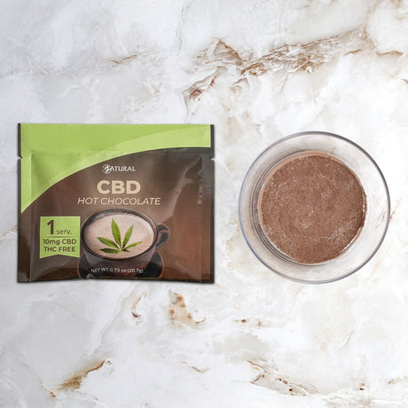 Zatural CBD Hot Chocolate next to powder in a bowl