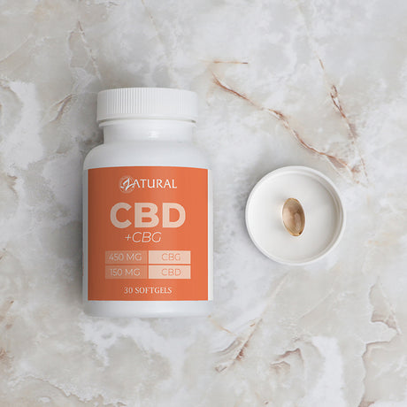 CBD + CBG supplement bottle on a marble surface