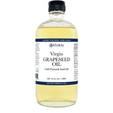 Bottle of virgin grapeseed oil with a label on a white background