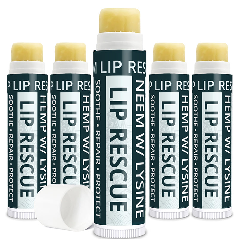 Multiple lip rescue products with green and white packaging on a white background