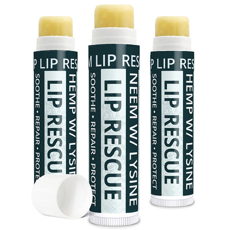 Three Lip Rescue lip balm sticks on a white background