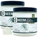 Two jars of Neem lotion with a small amount of lotion on a white background