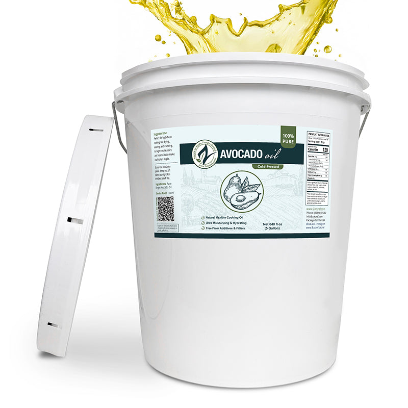 White bucket labeled 'Avocado oil' with a splash of oil above it on a white background