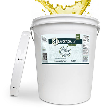 White bucket labeled 'Avocado oil' with a splash of oil above it on a white background