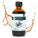 Zatural Black Castor Oil 8oz in a glass bottle splash