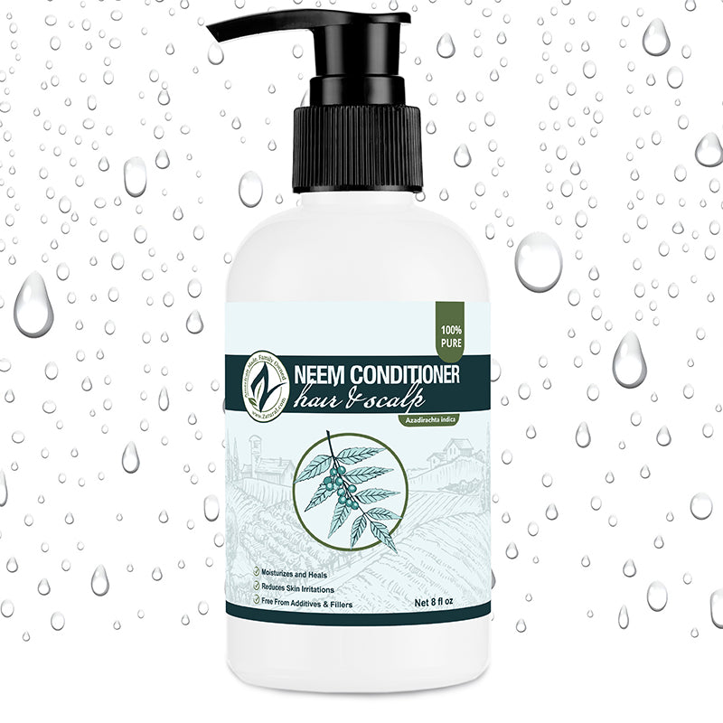 Neem conditioner bottle with pump on a white background with water droplets