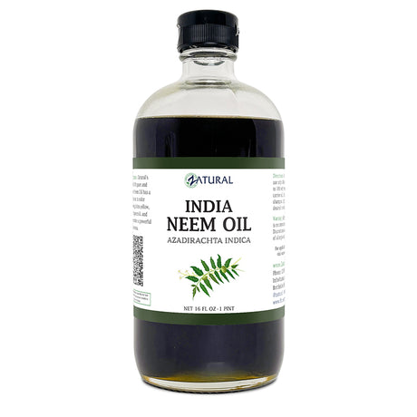 Bottle of India Neem Oil with a label on a white background