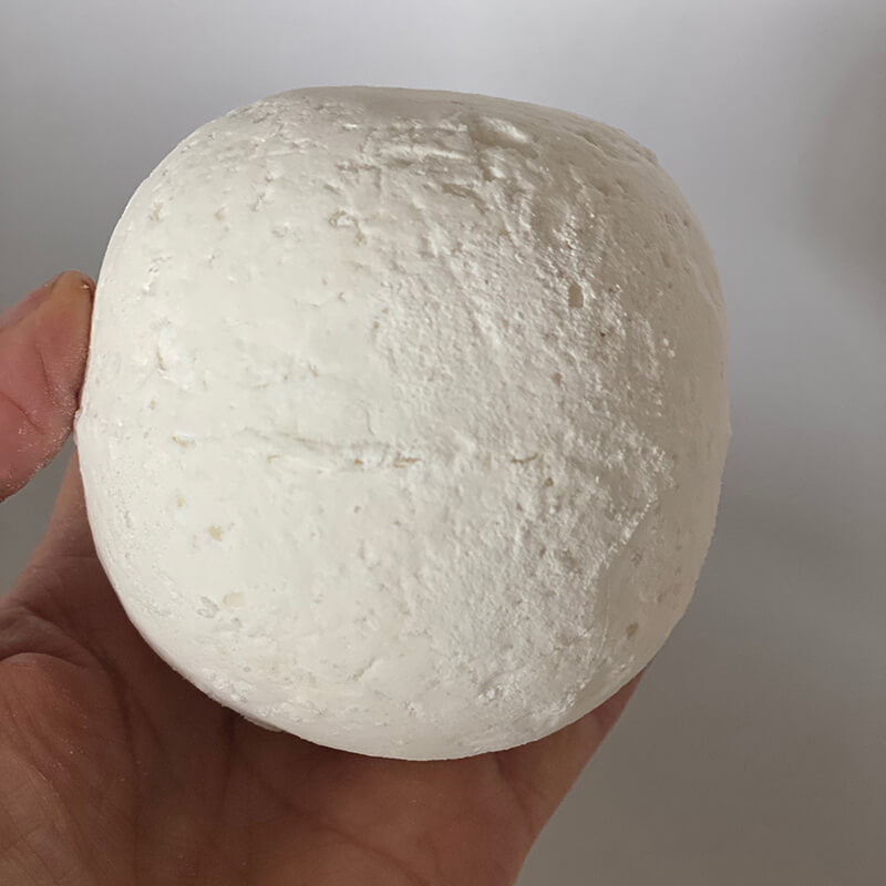 CBD four thieves Bath Bombs without wrapper in hand