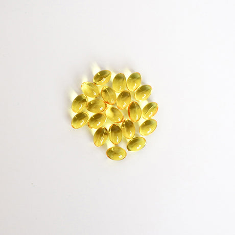 Broad Spectrum CBD Softgels with Curcumin in a group