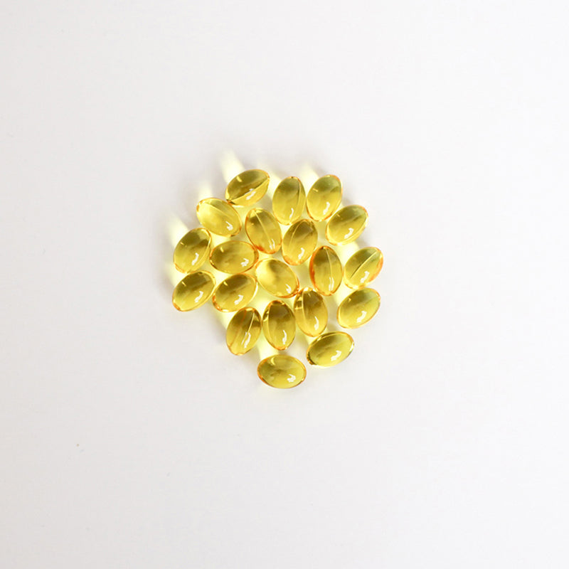 Hemp Extract Softgels With Curcumin in a pile