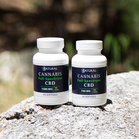 Full Spectrum CBD Softgels on a log