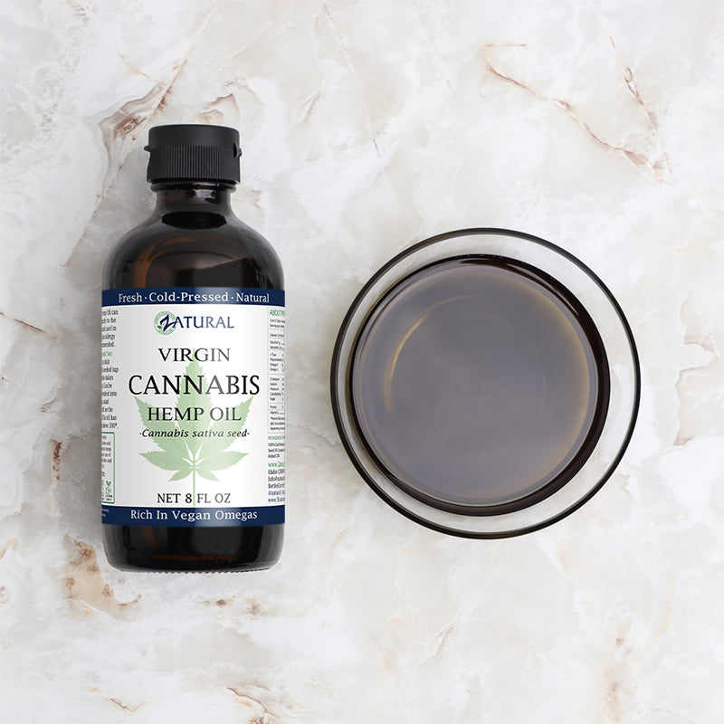 Zatural Cannabis Hemp Seed Oil 8oz with oil in bowl