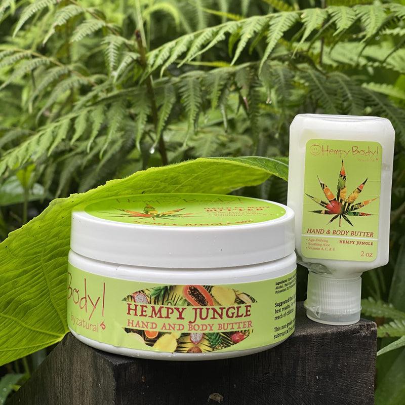 Hempy Jungle Body Butter Jar and 2oz squeeze bottle in the jungle